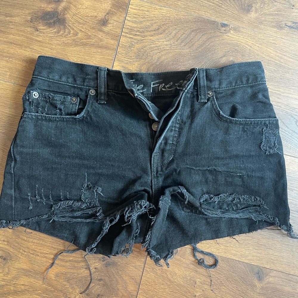Free People Black denim cutoffs.